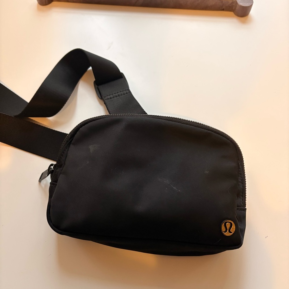 lululemon athletica Black Belt Bag with Gold Accent